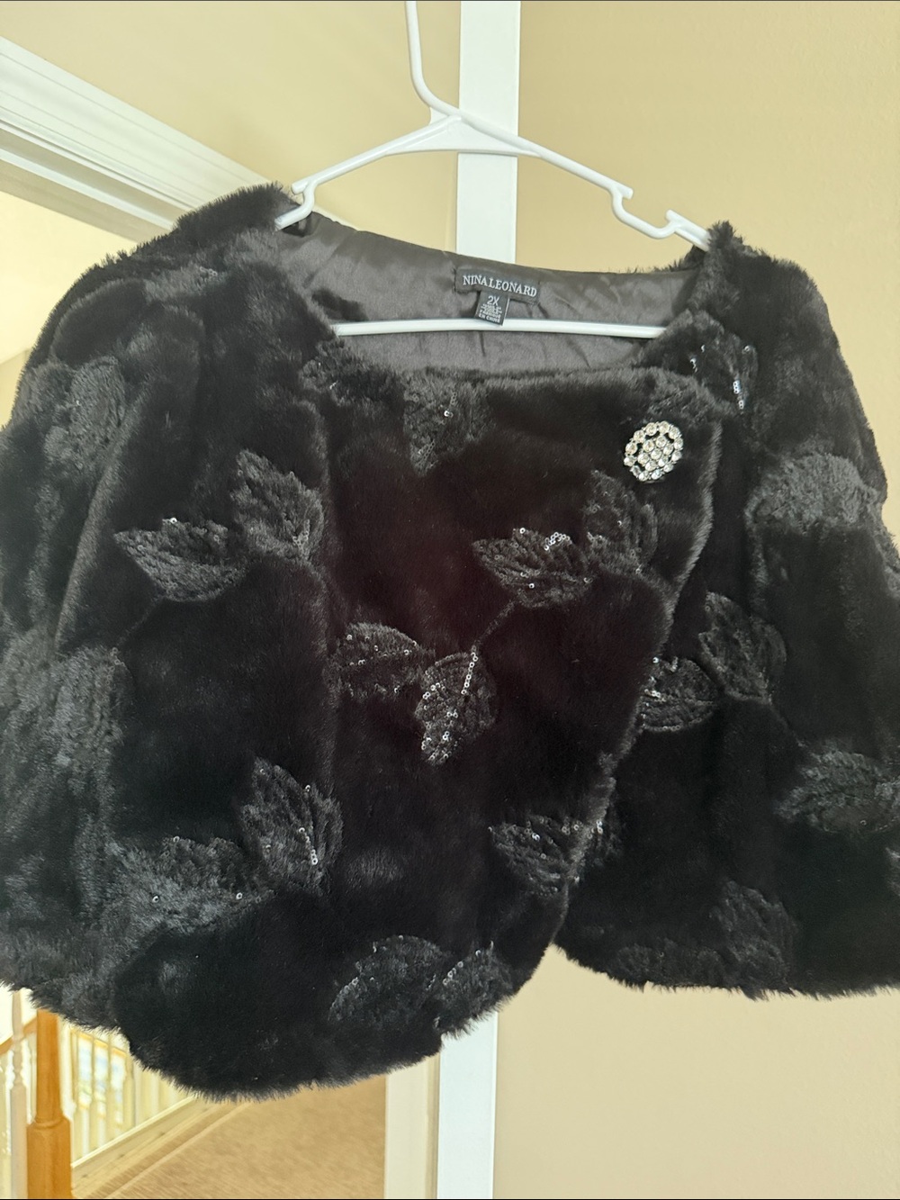 Nina Leonard Black Faux Fur Cropped Shrug with Decorative Brooch